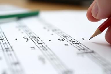 Musical notes and theory chart on a stand